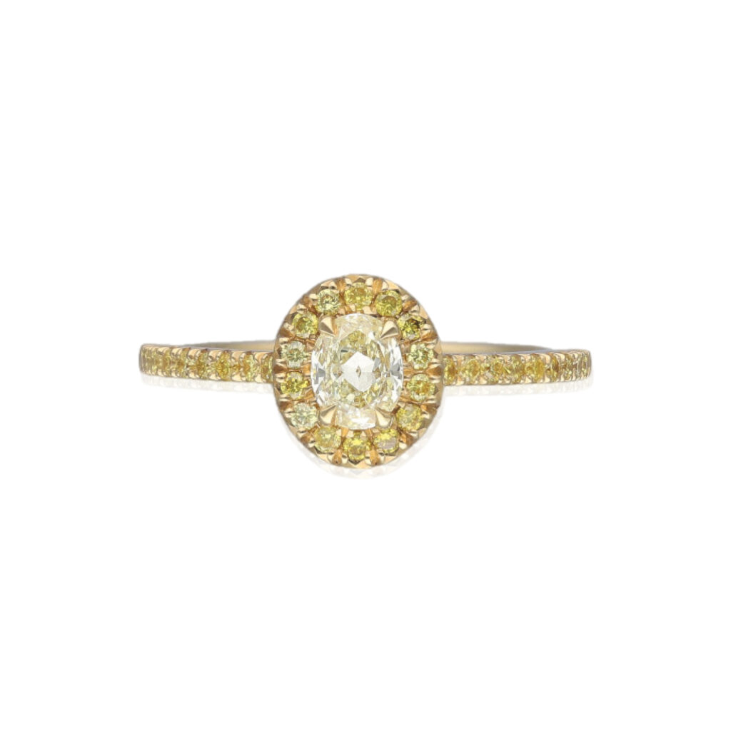 Natural Yellow diamond halo ring in 18ct yellow gold