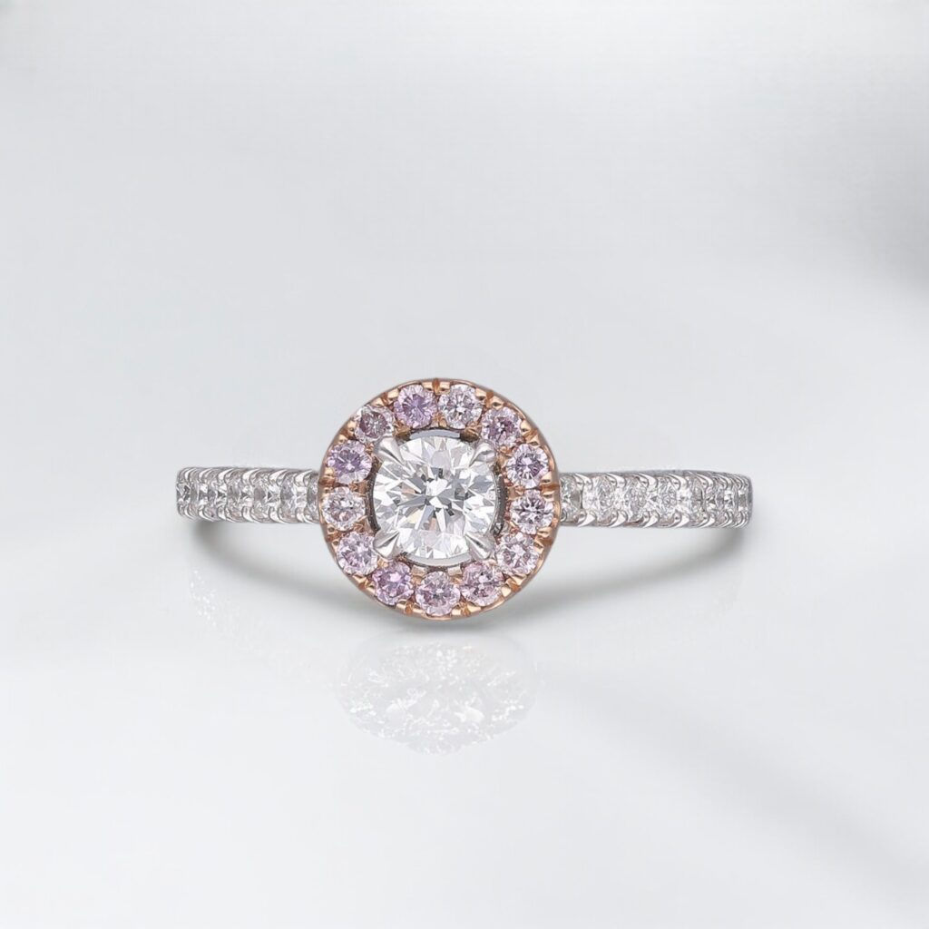 Round Brilliant & Pink Diamond Halo ring