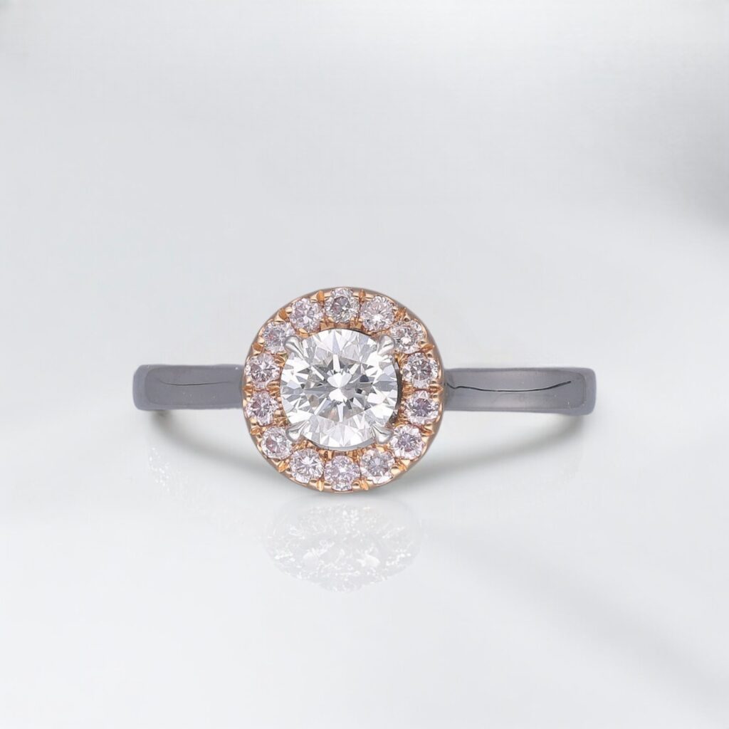 Round Brilliant & Pink Diamond Halo ring