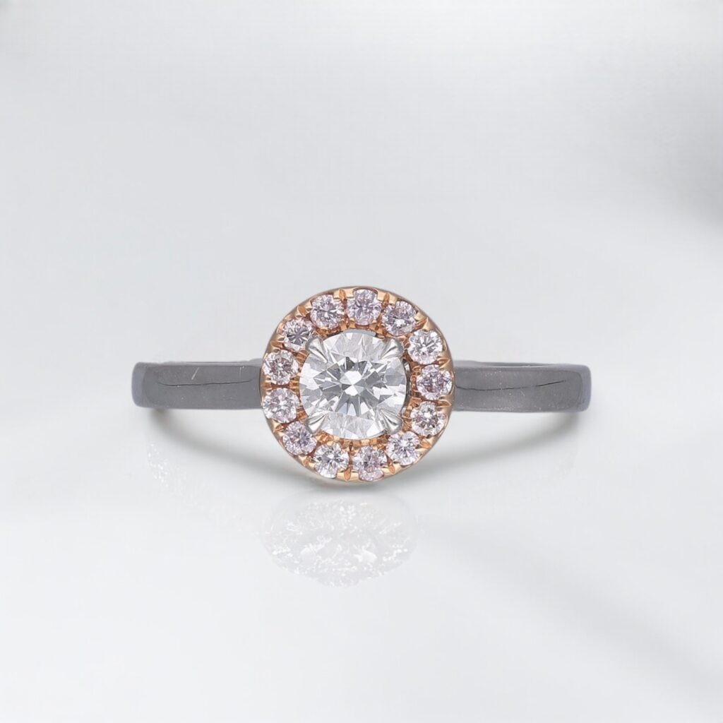 Round Brilliant & Pink Diamond Halo ring