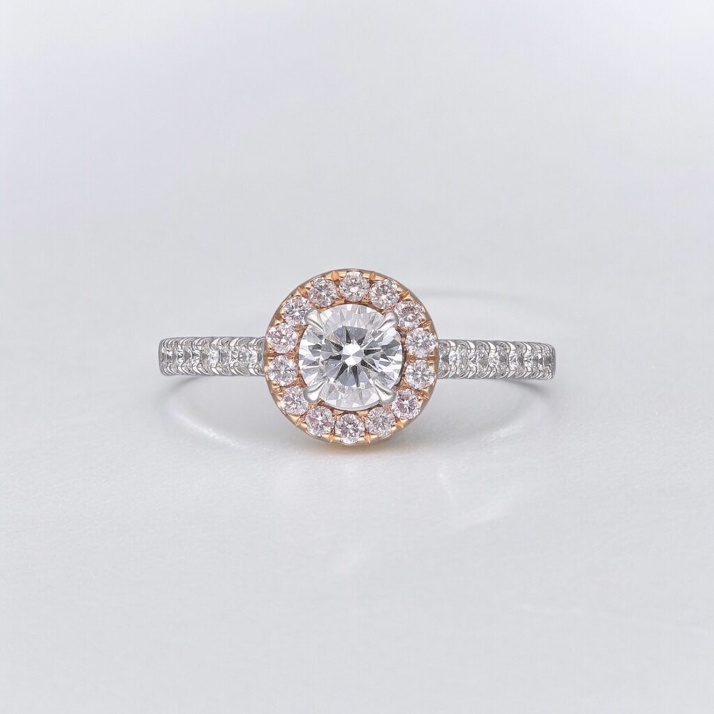Round Brilliant & Pink Diamond Halo ring